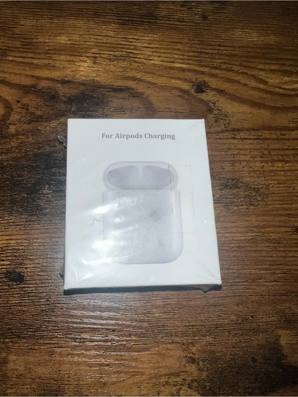 White AirPods Charging Case in Packaging